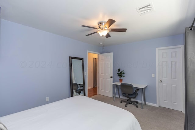 3002 S Polk St, Amarillo, TX 79109 - carpeted bedroom featuring a ceiling fan and baseboards