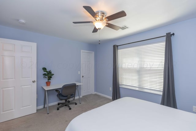 3002 S Polk St, Amarillo, TX 79109 - bedroom with carpet flooring, a ceiling fan, and baseboards