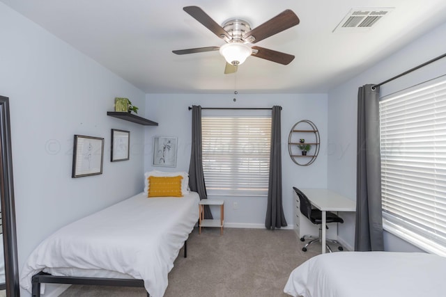 3002 S Polk St, Amarillo, TX 79109 - carpeted bedroom featuring a ceiling fan and baseboards