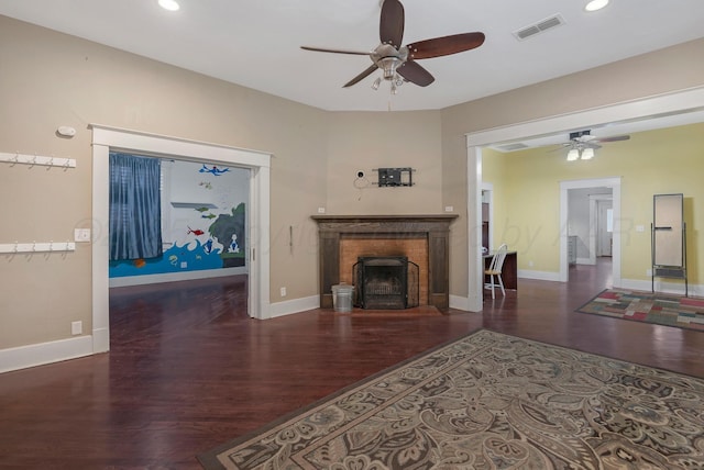 1717 S Tyler St, Amarillo, TX 79102 - living room featuring ceiling fan, wood finished floors, a fireplace, and recessed lighting