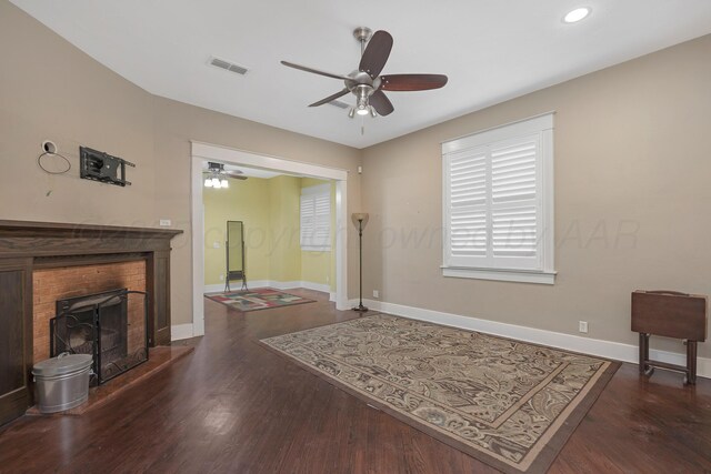 1717 S Tyler St, Amarillo, TX 79102 - living room featuring a ceiling fan, a fireplace, wood finished floors, and recessed lighting