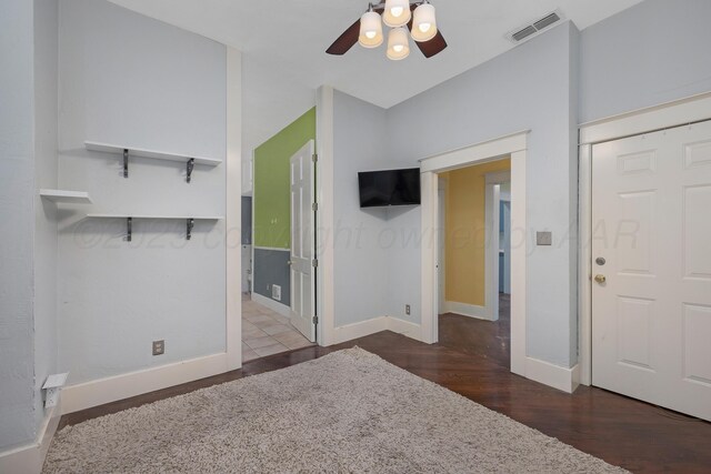 1717 S Tyler St, Amarillo, TX 79102 - unfurnished living room featuring wood finished floors and ceiling fan