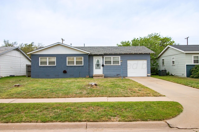 view of front of property featuring a front lawn, cooling unit, concrete driveway, an attached garage, and crawl space