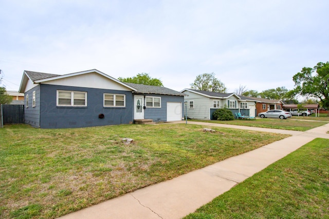 ranch-style home featuring fence, concrete driveway, crawl space, a front yard, and a garage