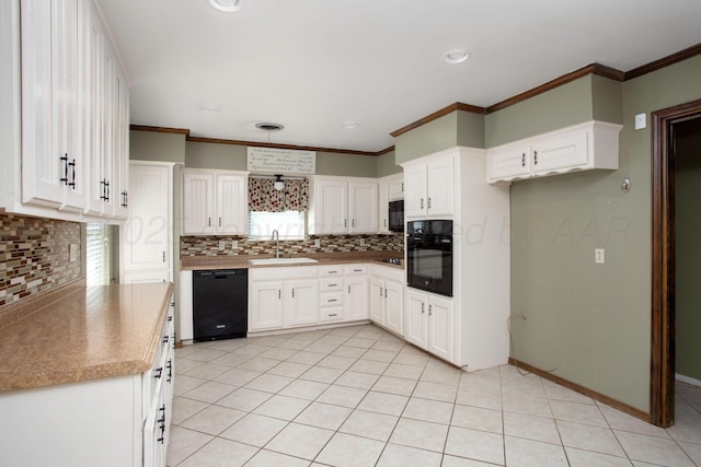 3729 Wayne St, Amarillo, TX 79109 - kitchen with black appliances, backsplash, white cabinetry, light tile patterned floors, and ornamental molding