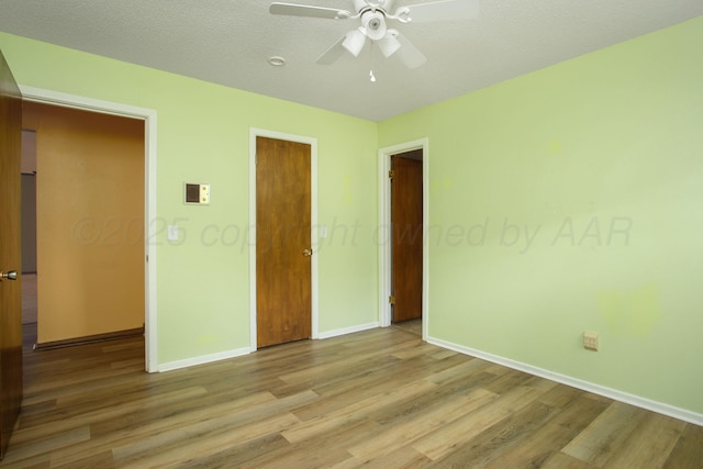 3729 Wayne St, Amarillo, TX 79109 - unfurnished bedroom with light wood-style floors, a ceiling fan, and a closet