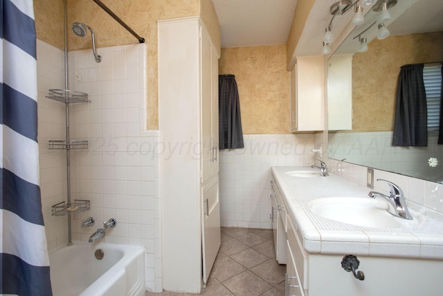 3729 Wayne St, Amarillo, TX 79109 - full bath with shower / bath combo, double vanity, tile patterned flooring, and tile walls