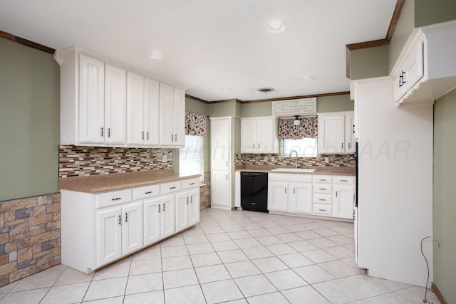 3729 Wayne St, Amarillo, TX 79109 - kitchen with black dishwasher, crown molding, white cabinetry, tasteful backsplash, and recessed lighting