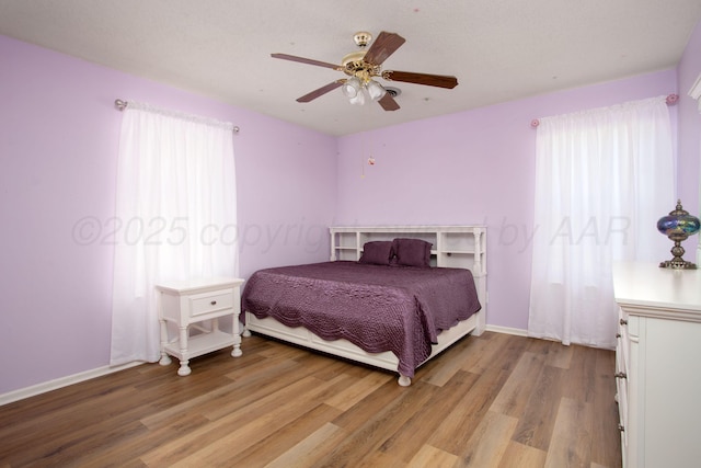 3729 Wayne St, Amarillo, TX 79109 - bedroom with light wood finished floors and ceiling fan