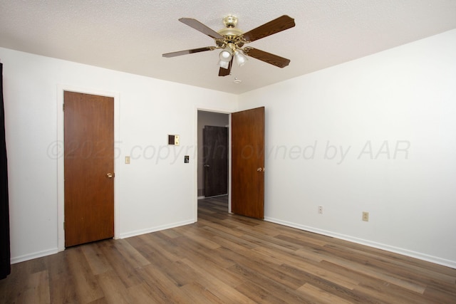 3729 Wayne St, Amarillo, TX 79109 - spare room with wood finished floors and a ceiling fan