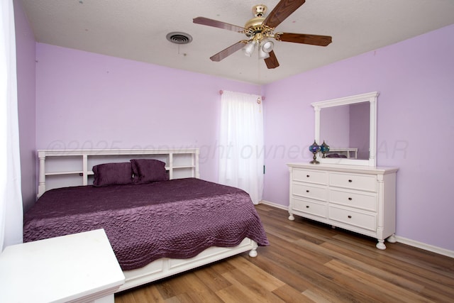 3729 Wayne St, Amarillo, TX 79109 - bedroom with wood finished floors and a ceiling fan