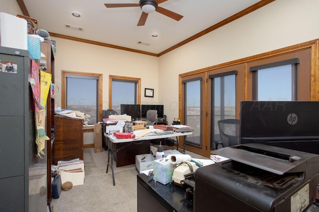 carpeted office with crown molding, ceiling fan, and visible vents