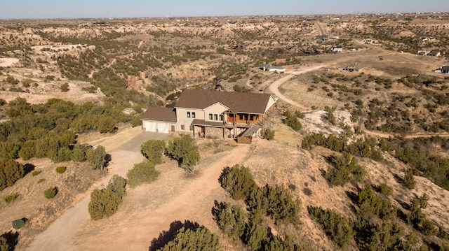 birds eye view of property featuring a rural view