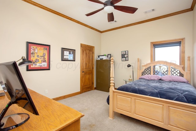 bedroom with crown molding, visible vents, baseboards, light colored carpet, and a ceiling fan