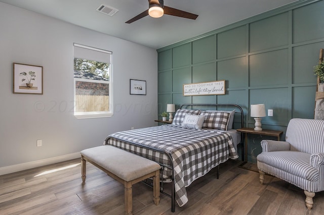 bedroom featuring ceiling fan and light hardwood / wood-style flooring