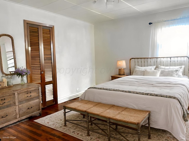 928 Elmore St, Borger, TX 79007 - bedroom with hardwood / wood-style floors and a closet