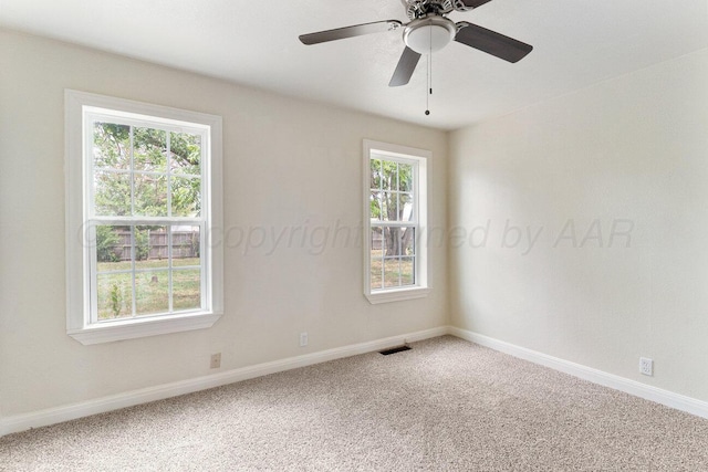 3201 S Grand St, Amarillo, TX 79103 - empty room with carpet and a ceiling fan
