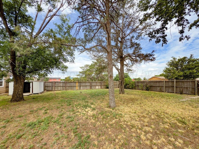 3201 S Grand St, Amarillo, TX 79103 - fenced backyard featuring a storage unit