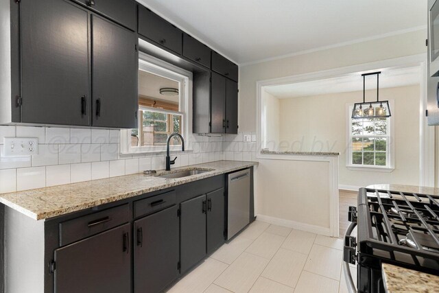 3201 S Grand St, Amarillo, TX 79103 - kitchen featuring dishwasher, tasteful backsplash, range with gas cooktop, light tile patterned floors, and ornamental molding