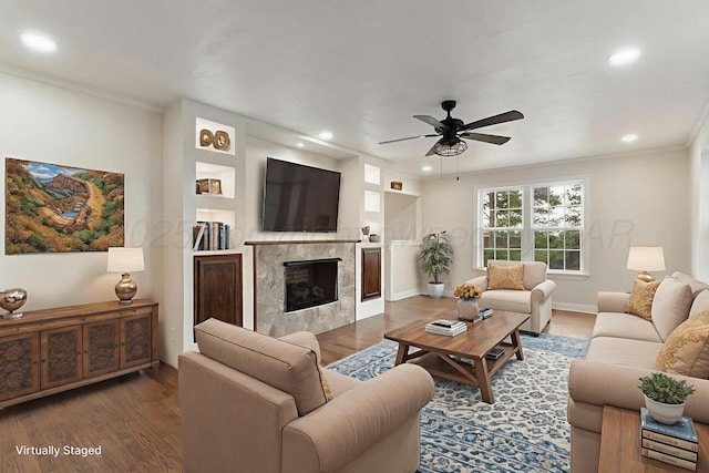 3201 S Grand St, Amarillo, TX 79103 - living room featuring ornamental molding, ceiling fan, recessed lighting, a fireplace, and wood finished floors