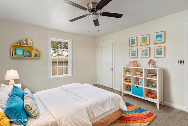 3201 S Grand St, Amarillo, TX 79103 - carpeted bedroom with baseboards and a ceiling fan