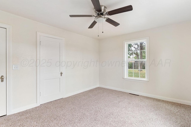 3201 S Grand St, Amarillo, TX 79103 - carpeted empty room featuring baseboards and a ceiling fan