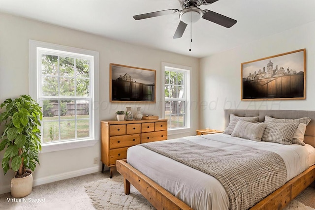 3201 S Grand St, Amarillo, TX 79103 - bedroom featuring multiple windows, carpet, and a ceiling fan