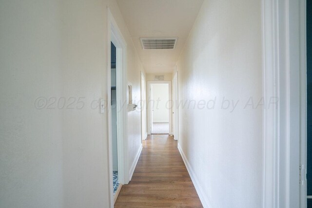 3201 S Grand St, Amarillo, TX 79103 - corridor with wood finished floors and baseboards