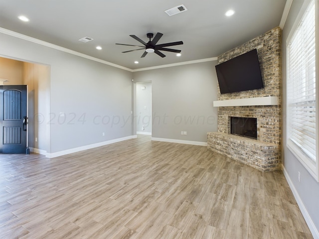 unfurnished living room with light wood-style flooring, visible vents, ceiling fan, and baseboards