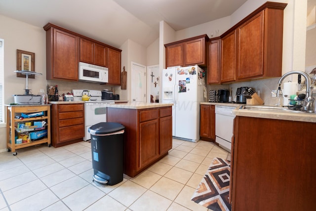 1405 SW 61st Ave, Amarillo, TX 79118 - kitchen with white appliances, light tile patterned floors, light countertops, backsplash, and lofted ceiling