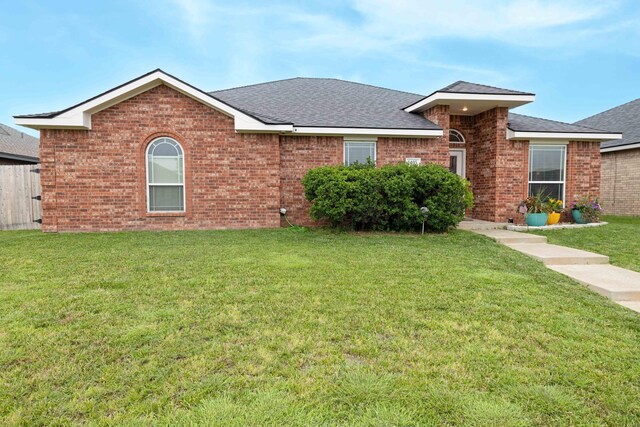 1405 SW 61st Ave, Amarillo, TX 79118 - single story home with brick siding and a shingled roof
