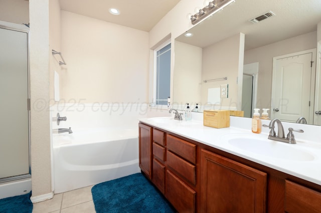 1405 SW 61st Ave, Amarillo, TX 79118 - full bath featuring a shower stall, a garden tub, double vanity, and tile patterned floors