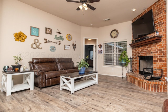 1405 SW 61st Ave, Amarillo, TX 79118 - living area with a ceiling fan, wood finished floors, and a fireplace