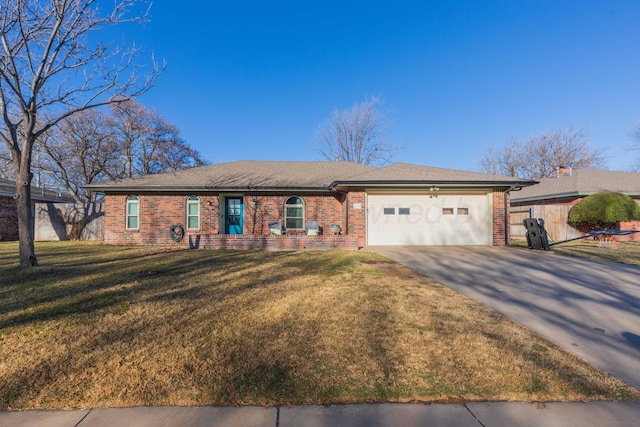 ranch-style house with a garage, concrete driveway, brick siding, and a front yard