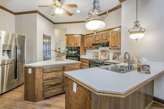 kitchen featuring sink, black appliances, kitchen peninsula, ornamental molding, and light hardwood / wood-style flooring