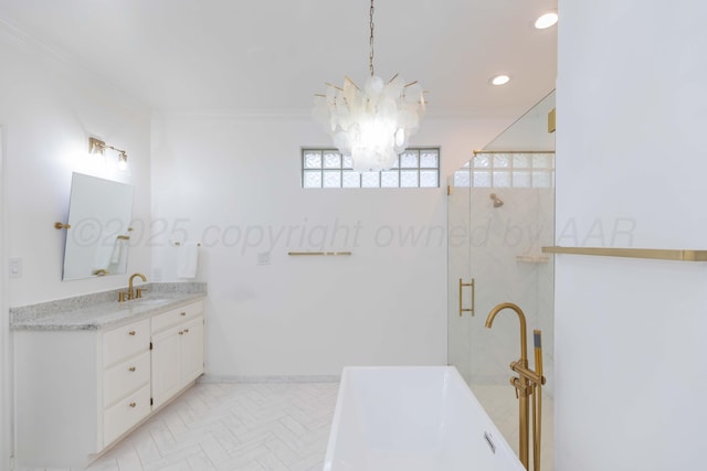 4511 Spartanburg Dr, Amarillo, TX 79119 - bathroom featuring a chandelier, ornamental molding, a freestanding bath, vanity, and an enclosed shower