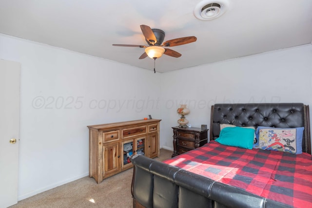 1102 Franklin Ave, Panhandle, TX 79068 - bedroom with light colored carpet and a ceiling fan