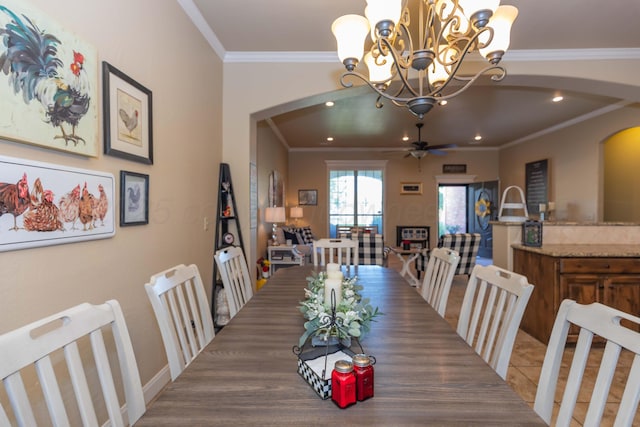 7409 Columbus Dr, Amarillo, TX 79118 - dining area with arched walkways, ornamental molding, a chandelier, and recessed lighting