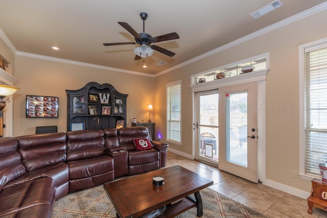 7409 Columbus Dr, Amarillo, TX 79118 - living room with healthy amount of natural light, light tile patterned floors, a ceiling fan, crown molding, and recessed lighting
