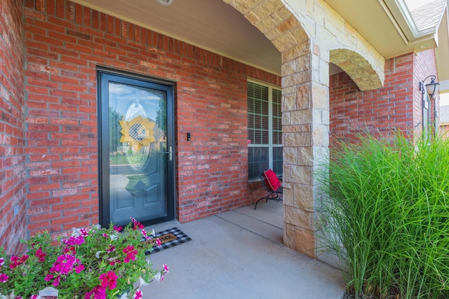 7409 Columbus Dr, Amarillo, TX 79118 - entrance to property with brick siding and a porch