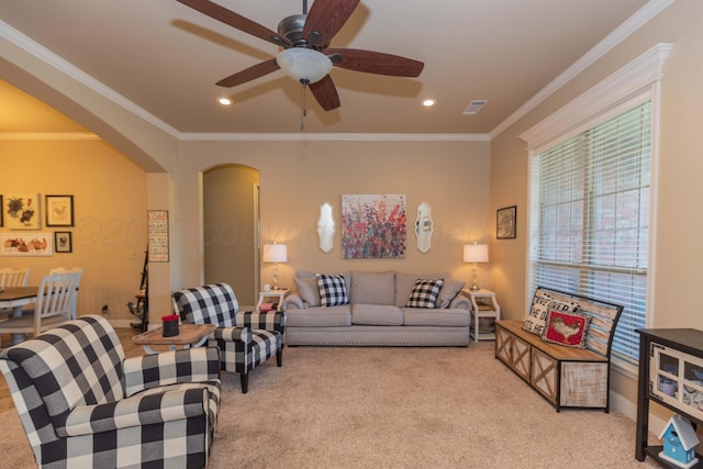 7409 Columbus Dr, Amarillo, TX 79118 - living area with carpet, arched walkways, ceiling fan, recessed lighting, and crown molding