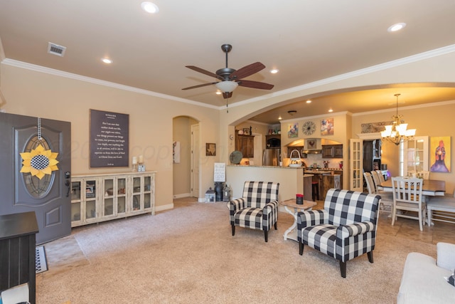 7409 Columbus Dr, Amarillo, TX 79118 - living area with a chandelier, crown molding, arched walkways, ceiling fan, and recessed lighting