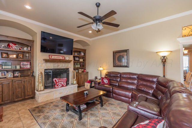 7409 Columbus Dr, Amarillo, TX 79118 - living area featuring a ceiling fan, a fireplace with raised hearth, ornamental molding, recessed lighting, and light tile patterned flooring