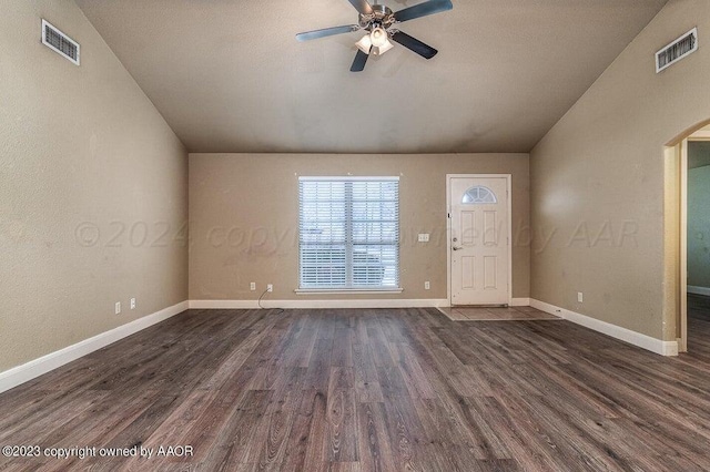 entrance foyer with dark hardwood / wood-style floors, ceiling fan, and vaulted ceiling