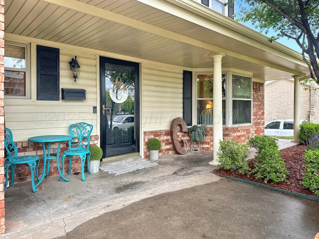 1417 Bluebonnet St, Borger, TX 79007 - entrance to property with a porch and brick siding