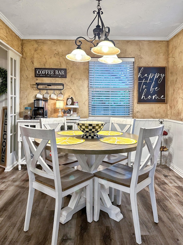 1417 Bluebonnet St, Borger, TX 79007 - dining area featuring wood finished floors and ornamental molding