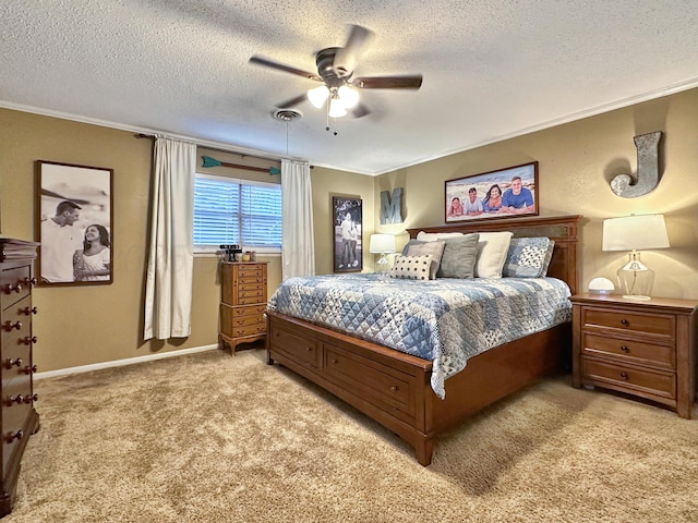 1417 Bluebonnet St, Borger, TX 79007 - bedroom featuring light colored carpet, crown molding, a textured ceiling, ceiling fan, and baseboards