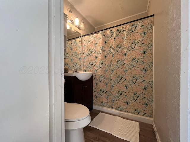 bathroom with ornamental molding, hardwood / wood-style floors, vanity, and toilet