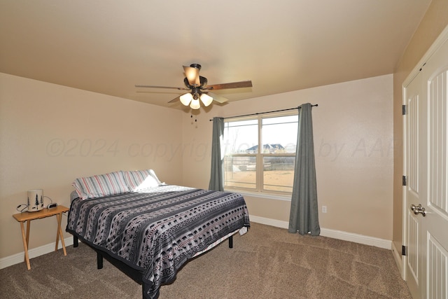 carpeted bedroom featuring ceiling fan