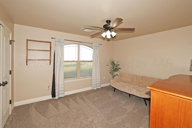 unfurnished room with carpet floors and ceiling fan